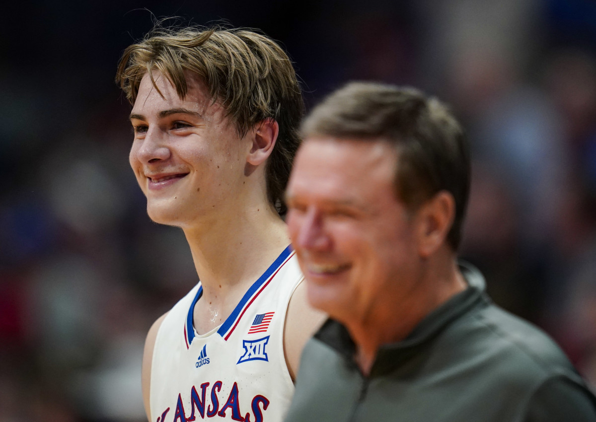 Nov 10, 2023; Lawrence, Kansas, USA; Kansas Jayhawks guard Johnny Furphy (10) and head coach Bill Self react during the second half against the Manhattan Jaspers at Allen Fieldhouse. Mandatory Credit: Jay Biggerstaff-USA TODAY Sports  